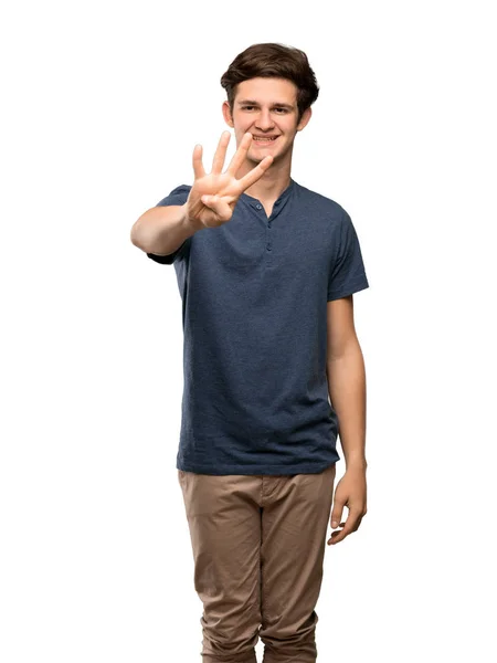 Dospívající Muž Šťastný Počítání Čtyři Prsty Nad Izolované Bílým Pozadím — Stock fotografie