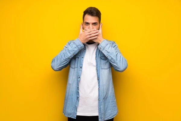 Handsome Man Yellow Wall Covering Mouth Hands Saying Something Inappropriate — Stock Photo, Image