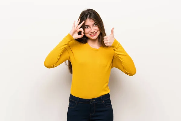Young Woman Yellow Sweater Showing Sign Giving Thumb Gesture — Stock Photo, Image