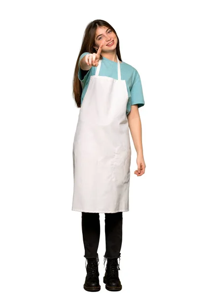 Full Length Shot Girl Apron Showing Lifting Finger Isolated White — Stock Photo, Image