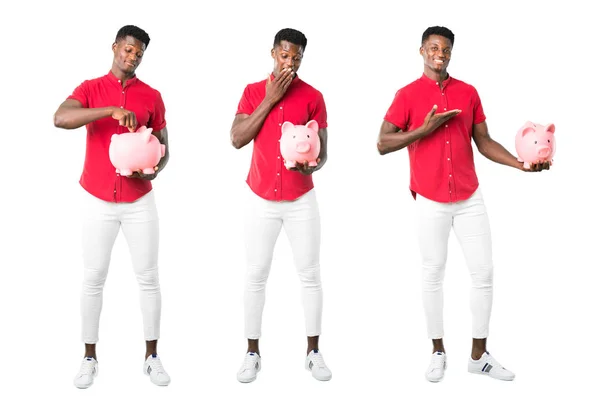 Fiatal Afroamerikai Férfi Meglepve Miközben Egy Nagy Piggybank Készlet — Stock Fotó