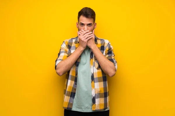 Handsome Man Yellow Wall Covering Mouth Hands Saying Something Inappropriate — Stock Photo, Image