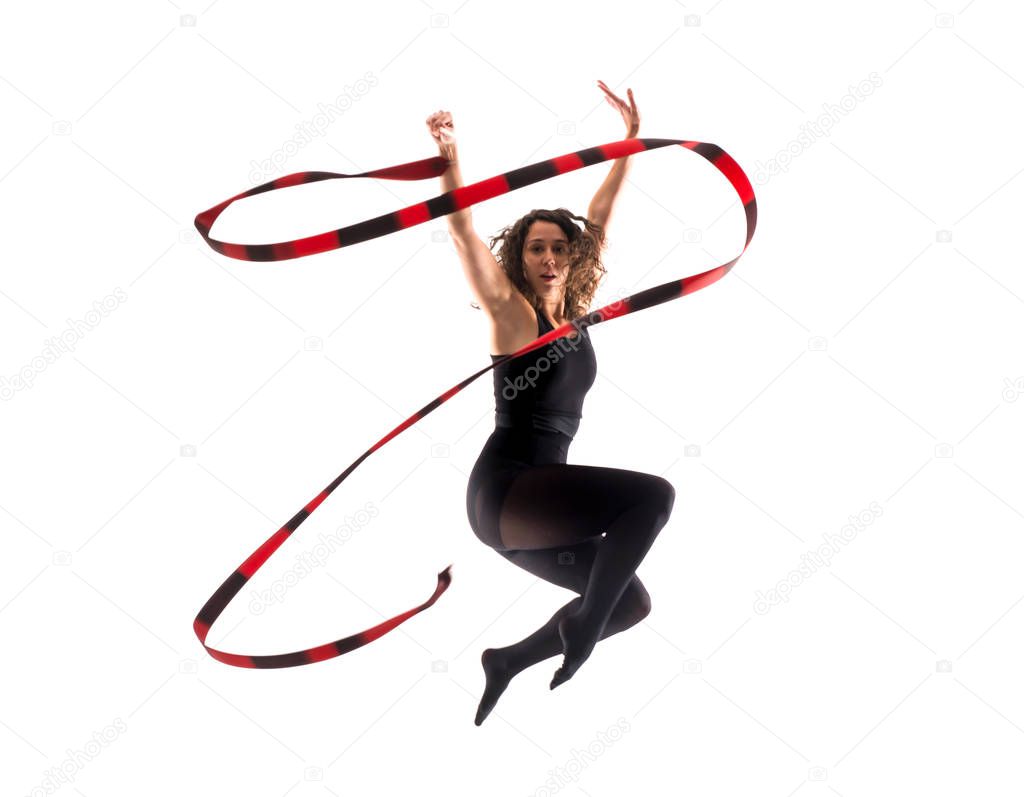 Woman doing rhythmic gymnastics with ribbon on isolated white background