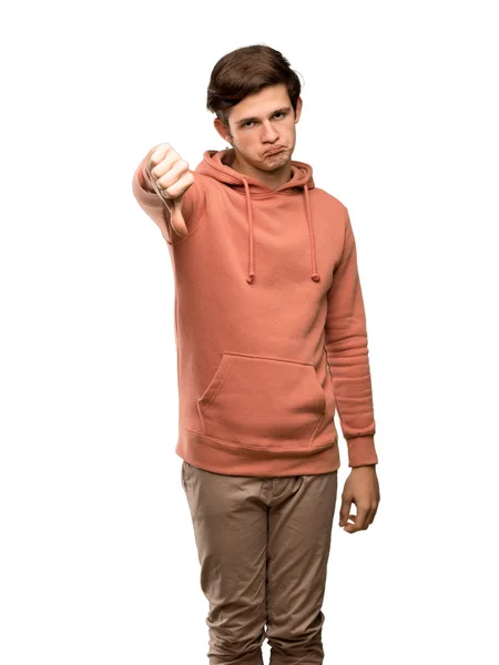 Έφηβο Άνθρωπος Φούτερ Δείχνει Αντίχειρα Προς Κάτω Αρνητική Έκφραση Πάνω — Φωτογραφία Αρχείου
