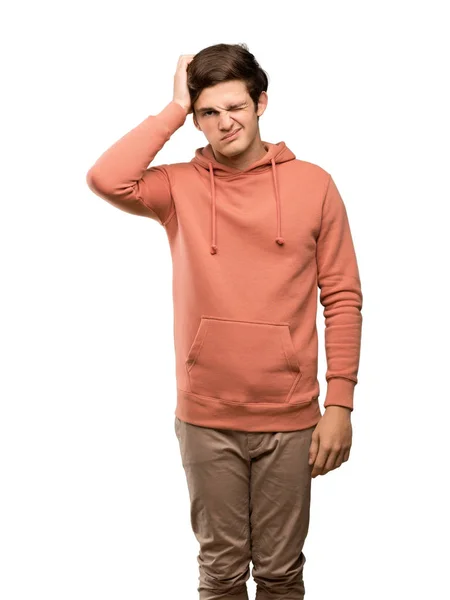 Teenager Mann Mit Sweatshirt Mit Ausdruck Von Frustration Und Unverständnis — Stockfoto