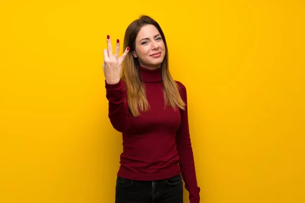 Woman Turtleneck Yellow Wall Happy Counting Three Fingers — Stock Photo, Image