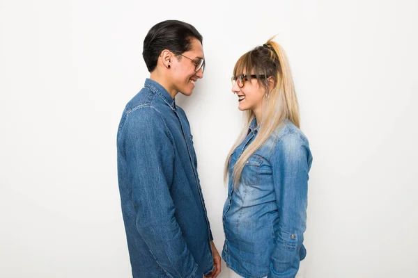 Young couple with glasses in lateral position