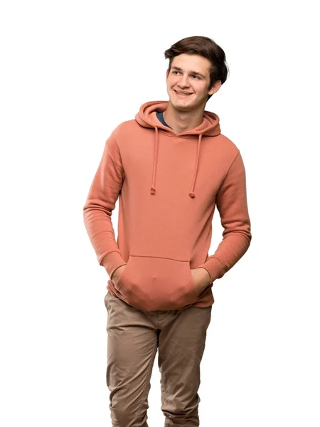 Adolescente Homem Com Camisola Rindo Olhando Para Frente Sobre Fundo — Fotografia de Stock
