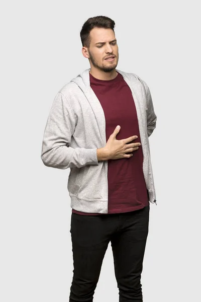 Mannen Med Sweatshirt Lider Ryggvärk För Att Gjort Ansträngning Över — Stockfoto