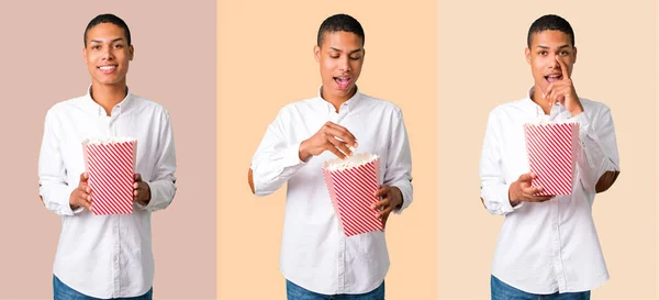 Conjunto Joven Afroamericano Con Camisa Blanca Comiendo Palomitas Tazón Grande —  Fotos de Stock