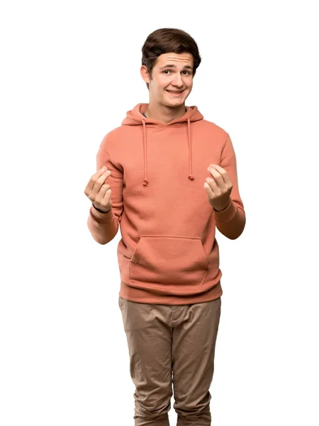 Adolescente Homem Com Camisola Fazendo Gesto Dinheiro Sobre Fundo Branco — Fotografia de Stock