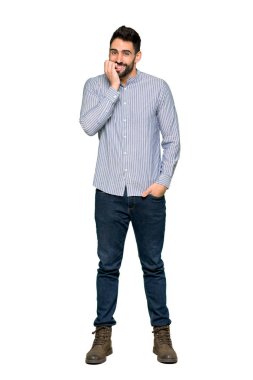 Biraz gergin ve korkmuş koyarak ellerini ağzına izole beyaz zemin üzerine gömlek ile zarif adamın tam uzunlukta vurulur