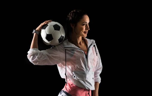 Sport Vrouw Donkere Achtergrond Met Een Voetbal — Stockfoto