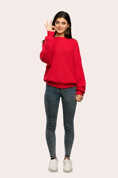 Eine Ganzkörperaufnahme Eines Teenagermädchens Mit Rotem Pullover Das Zeichen Mit — Stockfoto