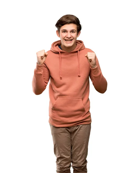 Tonåringen Man Med Sweatshirt Fira Seger Vinnare Position Över Isolerade — Stockfoto