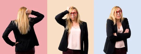 Set of Middle-age blonde business woman with black jacket with an expression of frustration and not understanding
