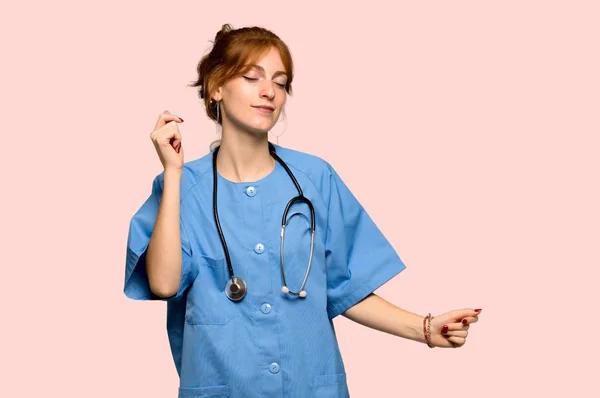 Young Redhead Nurse Enjoy Dancing While Listening Music Party Pink — Stock Photo, Image