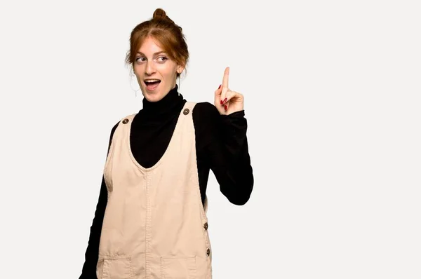 Young Redhead Woman Intending Realizes Solution While Lifting Finger Grey — Stock Photo, Image