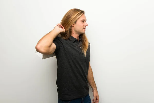 Blond Man Long Hair White Wall Holding Lot Shopping Bags — Stock Photo, Image