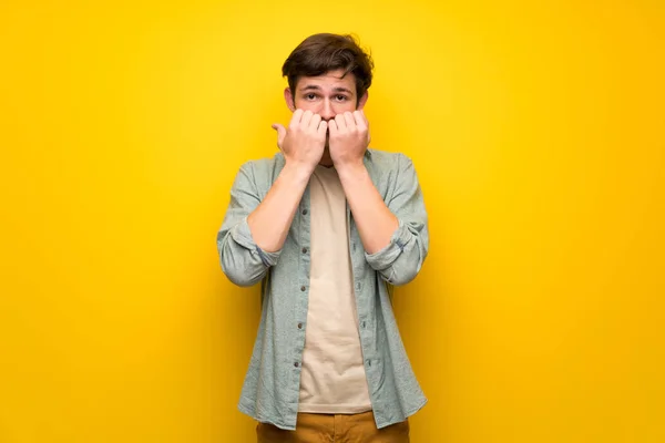 Teenager Man Yellow Wall Little Bit Nervous Scared Putting Hands — Stock Photo, Image