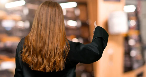 Young Redhead Chef Woman Pointing Back Index Finger Bakery — Stock Photo, Image