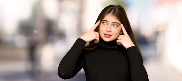 Pretty Girl Having Doubts Thinking Outdoors — Stock Photo, Image