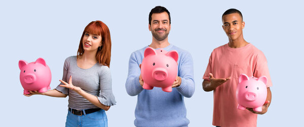 Group of three friends holding a big piggybank