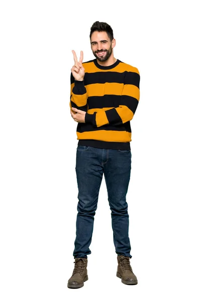 Full Length Shot Handsome Man Striped Sweater Smiling Showing Victory — Stock Photo, Image