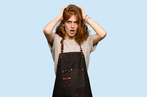 Young Redhead Woman Apron Takes Hands Head Because Has Migraine — Stock Photo, Image