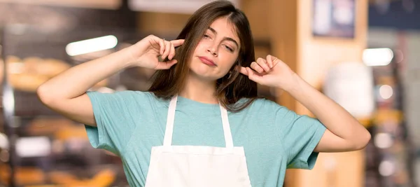 Girl Apron Covering Both Ears Hands Bakery — Stock Photo, Image