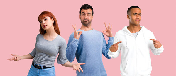 Group of three friends proud and self-satisfied in love yourself