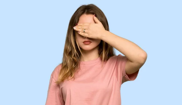 Teenager Girl Pink Sweater Covering Both Ears Hands Isolated Blue — Stock Photo, Image