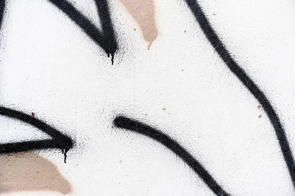 Detalhe de graffiti em uma parede. Efeito de textura — Fotografia de Stock