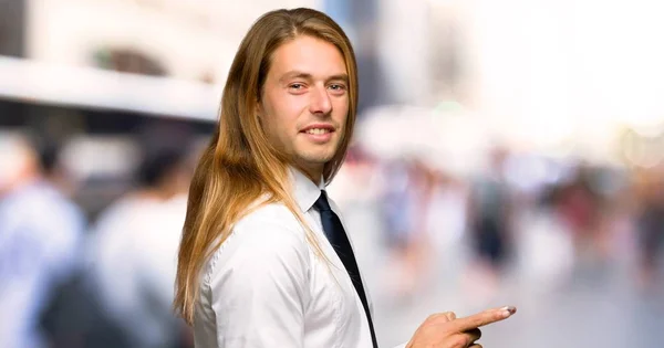 Blond Businessman Long Hair Sending Message Mobile Outdoors — Stock Photo, Image