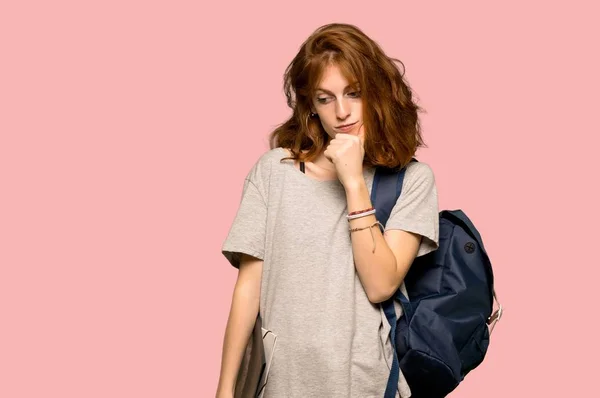 Young Redhead Student Looking Hand Chin Pink Background — Stock Photo, Image