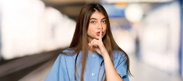 Young Nurse Showing Sign Silence Gesture Putting Finger Mouth Hospital — Stock Photo, Image