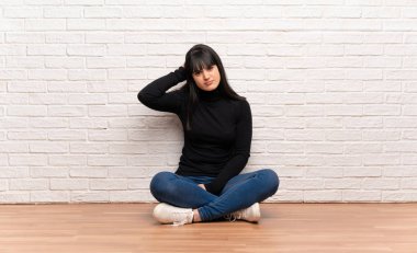 Şüpheleri katta oturan kadın