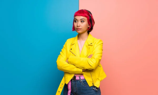 Young woman with yellow jacket portrait