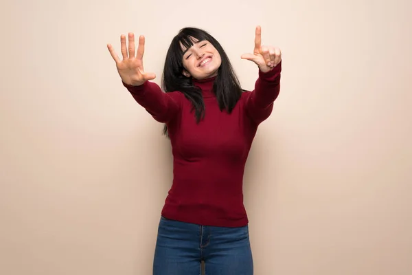 Young Woman Red Turtleneck Counting Seven Fingers — Stock Photo, Image