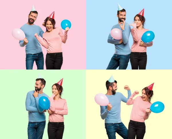 Set of couple with balloons and birthday hats showing an ok sign with fingers