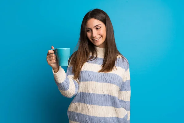 Young Woman Blue Wall Holding Hot Cup Coffee — Stock Photo, Image