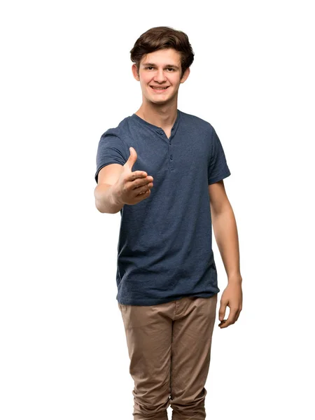 Adolescente Homem Apertando Mãos Para Fechar Bom Negócio Sobre Fundo — Fotografia de Stock