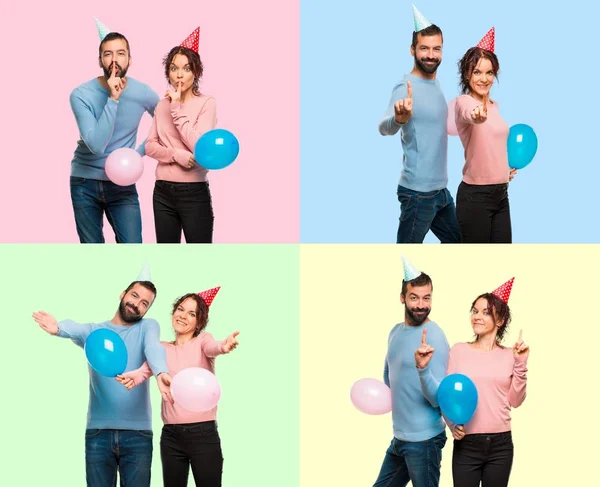 Set of couple with balloons and birthday hats counting one, and doing silence gesture