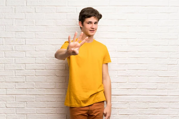 Teenager Man White Brick Wall Happy Counting Four Fingers — Stock Photo, Image