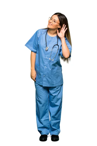 Ganzkörper Junger Krankenschwester Die Etwas Anhört Indem Sie Die Hand — Stockfoto