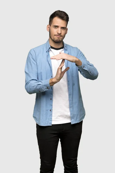 Handsome Man Making Time Out Gesture Grey Background — Stock Photo, Image