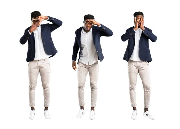 Conjunto de hombre afroamericano guapo usando una chaqueta enfocando la cara y mirando lejos —  Fotos de Stock