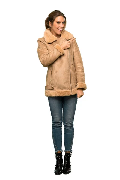 Full Length Shot Blonde Woman Coat Pointing Side Present Product — Stock Photo, Image