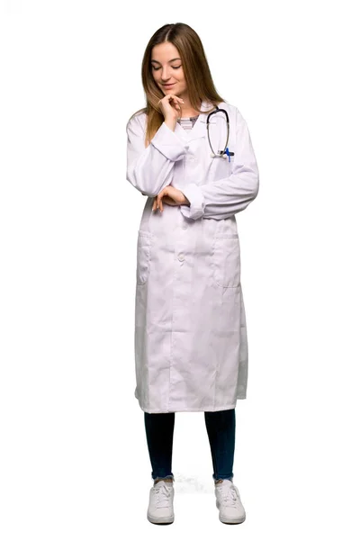 Full Body Young Doctor Woman Looking Hand Chin Isolated Background — Stock Photo, Image