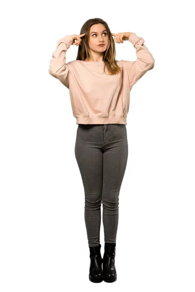 Full Length Shot Teenager Girl Pink Sweater Having Doubts Thinking — Stock Photo, Image